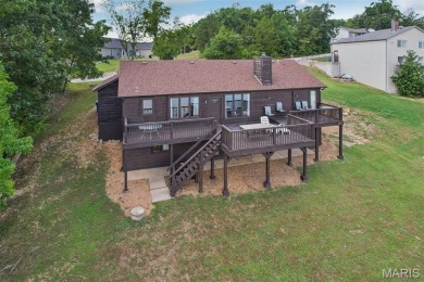 Charming Waterfront Ranch Home in Raintree Plantation

Discover on Raintree Country Club in Missouri - for sale on GolfHomes.com, golf home, golf lot