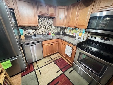 Enjoy easy, active living in this spacious 2-bedroom, 2-bath on The Carolina Club in Florida - for sale on GolfHomes.com, golf home, golf lot