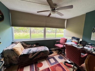 Enjoy easy, active living in this spacious 2-bedroom, 2-bath on The Carolina Club in Florida - for sale on GolfHomes.com, golf home, golf lot