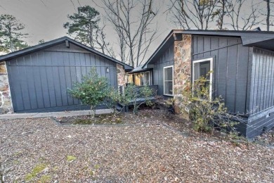 Welcome home to this charming 2-bedroom, 2-bathroom house! This on Mountain Ranch Golf Club in Arkansas - for sale on GolfHomes.com, golf home, golf lot