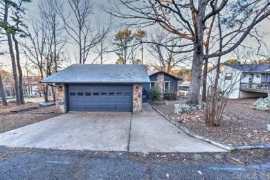 Welcome home to this charming 2-bedroom, 2-bathroom house! This on Mountain Ranch Golf Club in Arkansas - for sale on GolfHomes.com, golf home, golf lot