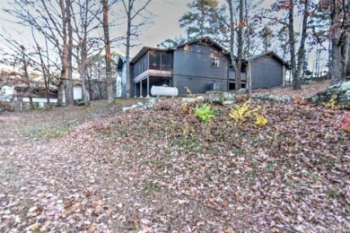Welcome home to this charming 2-bedroom, 2-bathroom house! This on Mountain Ranch Golf Club in Arkansas - for sale on GolfHomes.com, golf home, golf lot