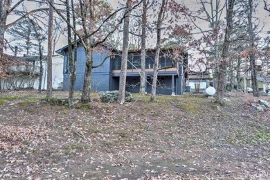 Welcome home to this charming 2-bedroom, 2-bathroom house! This on Mountain Ranch Golf Club in Arkansas - for sale on GolfHomes.com, golf home, golf lot