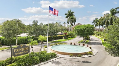 Sun-splashed and move-in ready, this airy second-floor residence on Fountains Golf and Country Club in Florida - for sale on GolfHomes.com, golf home, golf lot