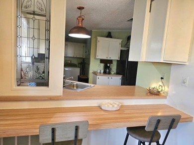 Don't miss your chance to own this well-maintained, 1056 sf on Crystal Lake Club in Florida - for sale on GolfHomes.com, golf home, golf lot