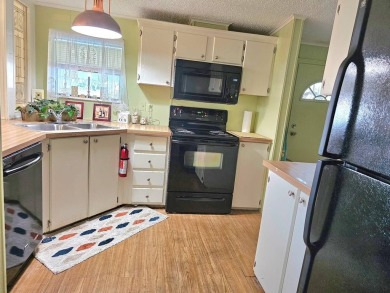 Don't miss your chance to own this well-maintained, 1056 sf on Crystal Lake Club in Florida - for sale on GolfHomes.com, golf home, golf lot