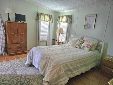 Don't miss your chance to own this well-maintained, 1056 sf on Crystal Lake Club in Florida - for sale on GolfHomes.com, golf home, golf lot
