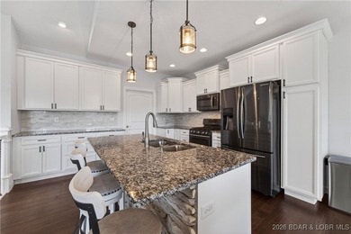 Set along the gorgeous shoreline of Lake of the Ozarks, this on Bayview Golf Course in Missouri - for sale on GolfHomes.com, golf home, golf lot