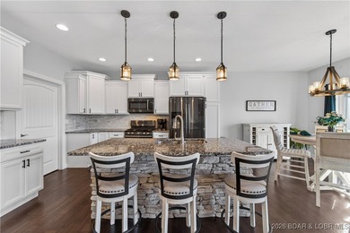 Set along the gorgeous shoreline of Lake of the Ozarks, this on Bayview Golf Course in Missouri - for sale on GolfHomes.com, golf home, golf lot