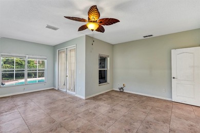 Opportunity to own this 4-bedroom, 3 bath pool home in on Wedgefield Golf Club in Florida - for sale on GolfHomes.com, golf home, golf lot