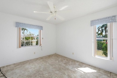 This home is ready to go! Large corner lot, gives you convenient on Sandpiper Golf Club in Florida - for sale on GolfHomes.com, golf home, golf lot