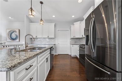 Set along the gorgeous shoreline of Lake of the Ozarks, this on Bayview Golf Course in Missouri - for sale on GolfHomes.com, golf home, golf lot