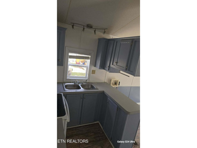 Own the lot and the lifestyle in this Lake Tansi RV Park on Lake Tansi Village Country Club in Tennessee - for sale on GolfHomes.com, golf home, golf lot