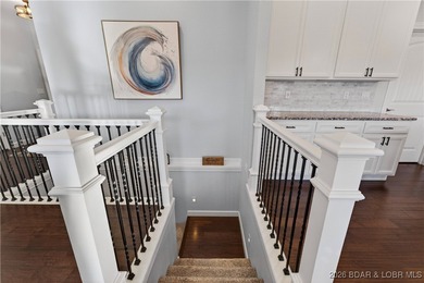 Set along the gorgeous shoreline of Lake of the Ozarks, this on Bayview Golf Course in Missouri - for sale on GolfHomes.com, golf home, golf lot