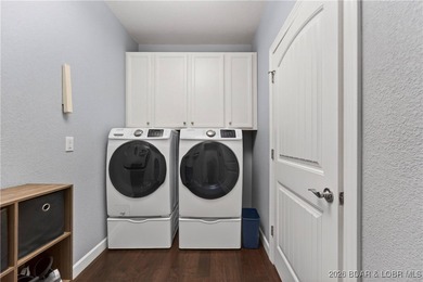 Set along the gorgeous shoreline of Lake of the Ozarks, this on Bayview Golf Course in Missouri - for sale on GolfHomes.com, golf home, golf lot