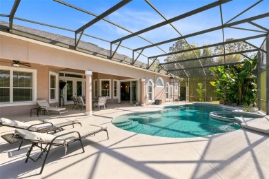 Your dream oasis awaits in this 5BR/3.5BA custom home with on Wedgefield Golf Club in Florida - for sale on GolfHomes.com, golf home, golf lot