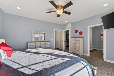 Set along the gorgeous shoreline of Lake of the Ozarks, this on Bayview Golf Course in Missouri - for sale on GolfHomes.com, golf home, golf lot