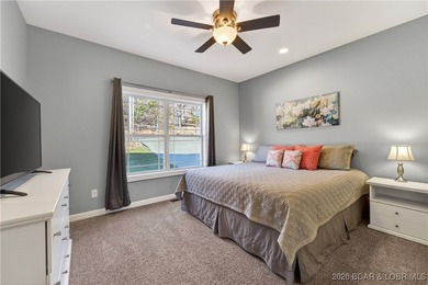 Set along the gorgeous shoreline of Lake of the Ozarks, this on Bayview Golf Course in Missouri - for sale on GolfHomes.com, golf home, golf lot