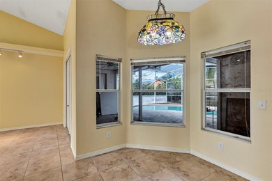 Opportunity to own this 4-bedroom, 3 bath pool home in on Wedgefield Golf Club in Florida - for sale on GolfHomes.com, golf home, golf lot