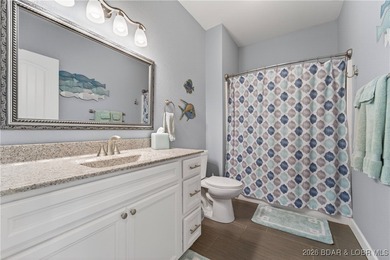 Set along the gorgeous shoreline of Lake of the Ozarks, this on Bayview Golf Course in Missouri - for sale on GolfHomes.com, golf home, golf lot