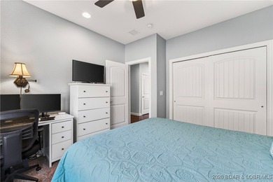 Set along the gorgeous shoreline of Lake of the Ozarks, this on Bayview Golf Course in Missouri - for sale on GolfHomes.com, golf home, golf lot