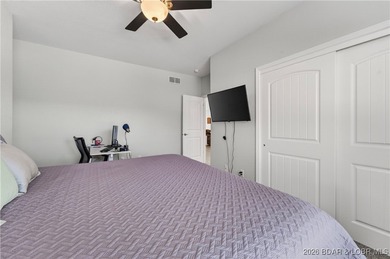 Set along the gorgeous shoreline of Lake of the Ozarks, this on Bayview Golf Course in Missouri - for sale on GolfHomes.com, golf home, golf lot