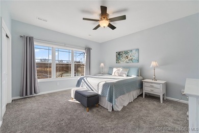 Set along the gorgeous shoreline of Lake of the Ozarks, this on Bayview Golf Course in Missouri - for sale on GolfHomes.com, golf home, golf lot