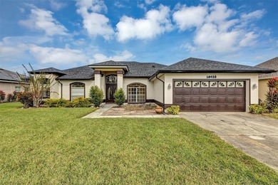 Opportunity to own this 4-bedroom, 3 bath pool home in on Wedgefield Golf Club in Florida - for sale on GolfHomes.com, golf home, golf lot