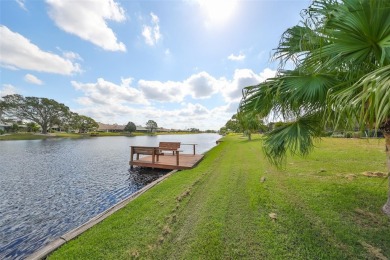 WELCOME TO YOUR BEAUTIFUL  METICULOUSLY KEPT HOME WITH AN on Caloosa Greens Executive Golf Course in Florida - for sale on GolfHomes.com, golf home, golf lot