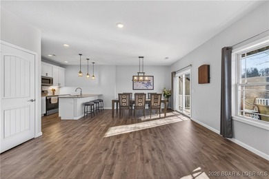 Set along the gorgeous shoreline of Lake of the Ozarks, this on Bayview Golf Course in Missouri - for sale on GolfHomes.com, golf home, golf lot