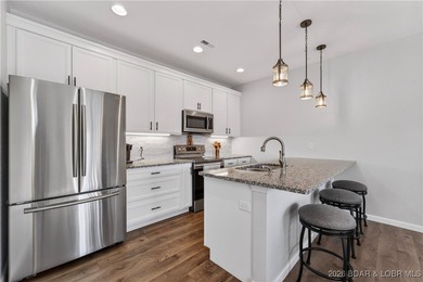 Set along the gorgeous shoreline of Lake of the Ozarks, this on Bayview Golf Course in Missouri - for sale on GolfHomes.com, golf home, golf lot