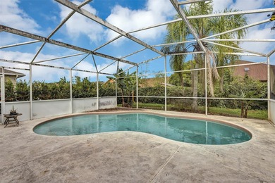 Opportunity to own this 4-bedroom, 3 bath pool home in on Wedgefield Golf Club in Florida - for sale on GolfHomes.com, golf home, golf lot
