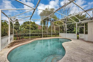 Opportunity to own this 4-bedroom, 3 bath pool home in on Wedgefield Golf Club in Florida - for sale on GolfHomes.com, golf home, golf lot