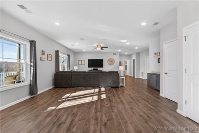 Set along the gorgeous shoreline of Lake of the Ozarks, this on Bayview Golf Course in Missouri - for sale on GolfHomes.com, golf home, golf lot