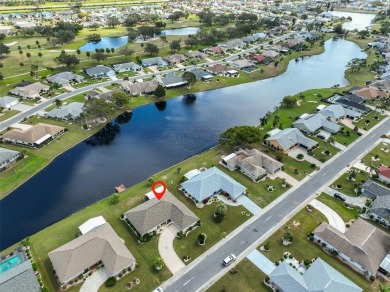 WELCOME TO YOUR BEAUTIFUL  METICULOUSLY KEPT HOME WITH AN on Caloosa Greens Executive Golf Course in Florida - for sale on GolfHomes.com, golf home, golf lot