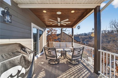 Set along the gorgeous shoreline of Lake of the Ozarks, this on Bayview Golf Course in Missouri - for sale on GolfHomes.com, golf home, golf lot