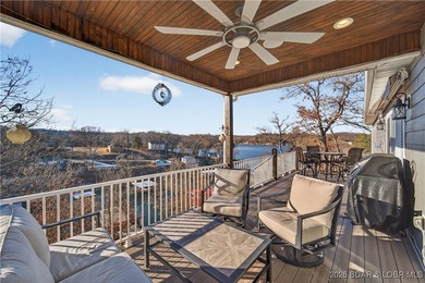 Set along the gorgeous shoreline of Lake of the Ozarks, this on Bayview Golf Course in Missouri - for sale on GolfHomes.com, golf home, golf lot