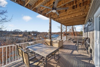 Set along the gorgeous shoreline of Lake of the Ozarks, this on Bayview Golf Course in Missouri - for sale on GolfHomes.com, golf home, golf lot