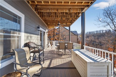 Set along the gorgeous shoreline of Lake of the Ozarks, this on Bayview Golf Course in Missouri - for sale on GolfHomes.com, golf home, golf lot