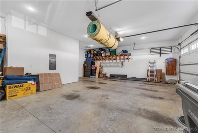 Set along the gorgeous shoreline of Lake of the Ozarks, this on Bayview Golf Course in Missouri - for sale on GolfHomes.com, golf home, golf lot