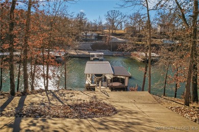 Set along the gorgeous shoreline of Lake of the Ozarks, this on Bayview Golf Course in Missouri - for sale on GolfHomes.com, golf home, golf lot