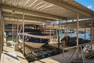 Set along the gorgeous shoreline of Lake of the Ozarks, this on Bayview Golf Course in Missouri - for sale on GolfHomes.com, golf home, golf lot