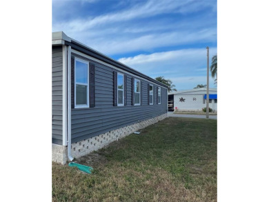 Welcome to this charming 2-bedroom, 2-bath home located in the on Fairway Village Golf Course in Florida - for sale on GolfHomes.com, golf home, golf lot