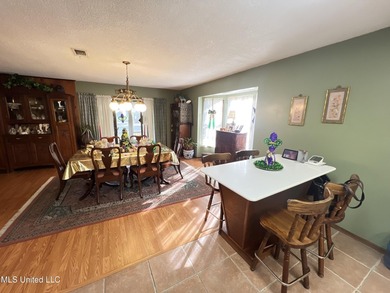 Prime Golf Course Living in Diamondhead | Wake up to sweeping on Diamondhead Country Club in Mississippi - for sale on GolfHomes.com, golf home, golf lot