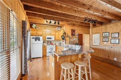 Welcome home to this charming Mountain Cottage. Nestled in the on Big Canoe Golf Club - Cherokee in Georgia - for sale on GolfHomes.com, golf home, golf lot
