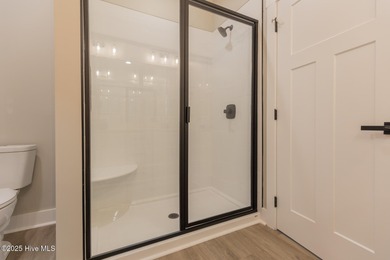 This newly built 4-bedroom, 2-bath home in the ever popular on Seven Lakes Country Club in North Carolina - for sale on GolfHomes.com, golf home, golf lot