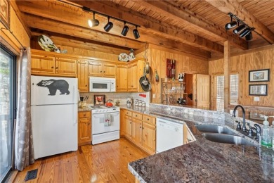Welcome home to this charming Mountain Cottage. Nestled in the on Big Canoe Golf Club - Cherokee in Georgia - for sale on GolfHomes.com, golf home, golf lot