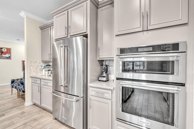 Welcome to The Enclave at Woodmont! This 5-bedroom, 3-bath home on  in Florida - for sale on GolfHomes.com, golf home, golf lot