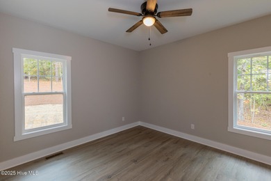 This newly built 4-bedroom, 2-bath home in the ever popular on Seven Lakes Country Club in North Carolina - for sale on GolfHomes.com, golf home, golf lot