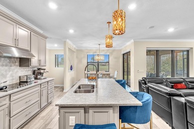 Welcome to The Enclave at Woodmont! This 5-bedroom, 3-bath home on  in Florida - for sale on GolfHomes.com, golf home, golf lot